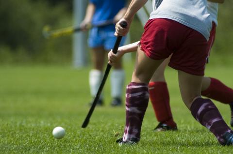 Hockey op grasveld